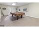 Recreation room featuring a classic billiard table with ample space for entertainment at 8040 Classic Dr, Jonesboro, GA 30236