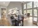 Sun-filled living room with hardwood floors, fireplace, and soaring ceilings at 8040 Classic Dr, Jonesboro, GA 30236