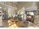Open-concept living room with hardwood floors and large windows at 8040 Classic Dr, Jonesboro, GA 30236