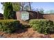 The Lake Spivey Country Club sign set in a brick wall with landscaping at 8040 Classic Dr, Jonesboro, GA 30236
