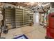 Unfinished basement storage area with exposed ceiling and shelving at 8040 Classic Dr, Jonesboro, GA 30236