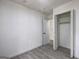 Bedroom showing wood-look floors and closet at 6454 Boca Grande Blvd, Forest Park, GA 30297