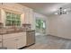 Bright kitchen featuring stainless steel appliances, granite countertops, and natural light at 6454 Boca Grande Blvd, Forest Park, GA 30297