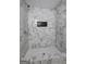 Shower featuring gray and white tiling, and a tiled shower niche at 6454 Boca Grande Blvd, Forest Park, GA 30297