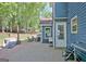 Brick backyard patio featuring an adjacent grill, providing a convenient area for outdoor entertaining and culinary adventures at 1310 Yarborough Dr, Peachtree City, GA 30269