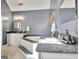 Bathroom with a soaking tub, granite countertops, and grey walls at 1310 Yarborough Dr, Peachtree City, GA 30269