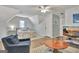 Comfortable bedroom with a cozy bed, stylish decor, and a functional entertainment area, perfect for relaxation and entertainment at 1310 Yarborough Dr, Peachtree City, GA 30269
