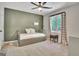 Cozy bedroom showcasing a daybed with pull-out drawers and neutral decor at 1310 Yarborough Dr, Peachtree City, GA 30269