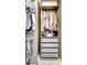 Neatly organized closet with multiple drawers and ample hanging space at 1310 Yarborough Dr, Peachtree City, GA 30269