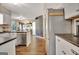 The kitchen features stainless appliances and leads to the living room at 1310 Yarborough Dr, Peachtree City, GA 30269