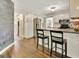 Spacious kitchen with an island, white cabinets, and a modern design at 1310 Yarborough Dr, Peachtree City, GA 30269