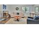 Cozy living room showcases a plush sofa, round coffee table, and stylish decor, perfect for relaxing and entertaining at 1310 Yarborough Dr, Peachtree City, GA 30269