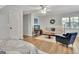 Inviting living area with a comfortable sofa, round coffee table, and modern entertainment setup, creating a relaxing space at 1310 Yarborough Dr, Peachtree City, GA 30269