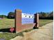 Community school sign with the names of each school and the logo for each on the sign at 1310 Yarborough Dr, Peachtree City, GA 30269