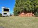 Exterior shot of Starr's Mill High School sign and landscaping featuring area school information at 1310 Yarborough Dr, Peachtree City, GA 30269