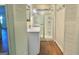 Bathroom showcasing shower with glass doors and single vanity at 1655 Tryon Ne Rd, Brookhaven, GA 30319
