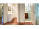 Dual bathroom view featuring classic fixtures and connecting layout at 1655 Tryon Ne Rd, Brookhaven, GA 30319