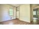 Bedroom featuring a closet, window and connecting rooms at 1655 Tryon Ne Rd, Brookhaven, GA 30319