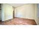 Bedroom featuring hardwood floors and large closet for storage needs at 1655 Tryon Ne Rd, Brookhaven, GA 30319