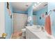 Bright and airy bathroom featuring a white vanity and a shower-tub combo at 190 Ridgecrest Dr, Fayetteville, GA 30215