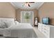 Bright bedroom offering a ceiling fan and a nice view to the exterior at 190 Ridgecrest Dr, Fayetteville, GA 30215