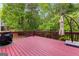 Outdoor deck with grill and wooded views at 190 Ridgecrest Dr, Fayetteville, GA 30215