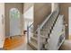 Spacious foyer with wood flooring and staircase leading to upper level at 190 Ridgecrest Dr, Fayetteville, GA 30215