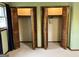 Spacious bedroom closet with bi-fold doors and custom shelving for organization at 8315 Ridge Rd, Fairburn, GA 30213