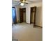 Carpeted bedroom includes ceiling fan with lighting and double closets at 8315 Ridge Rd, Fairburn, GA 30213