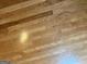 Angle shot of a hardwood floor with planks running diagonally at 8315 Ridge Rd, Fairburn, GA 30213