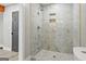 Bathroom with a tiled shower, niche storage, and modern fixtures at 3650 Adkins Nw Rd, Atlanta, GA 30331