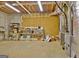 Unfinished basement with concrete walls and floors and exposed utilities at 40 High St, Sharpsburg, GA 30277