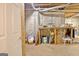 Unfinished basement with concrete walls and floors, and exposed pipes at 40 High St, Sharpsburg, GA 30277