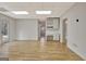 Open bonus room with built in desk/shelving, exterior door and wood floor at 40 High St, Sharpsburg, GA 30277