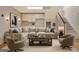 Cozy living room featuring a sectional couch and modern decor at 40 High St, Sharpsburg, GA 30277