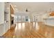 Large living area with fireplace, hardwood floors, and lots of natural light at 40 High St, Sharpsburg, GA 30277