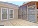 A cozy, covered outdoor living space with a screened-in porch that overlooks the backyard at 40 High St, Sharpsburg, GA 30277