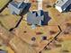 Bird's-eye view of a property highlighting its expansive backyard, including features like a trampoline and storage shed at 3226 Puritan Way, Mcdonough, GA 30252