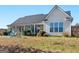 Lovely backyard with a covered porch and comfortable seating arrangement at 3226 Puritan Way, Mcdonough, GA 30252