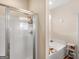 Bathroom featuring a shower with glass door and a large soaking tub at 3226 Puritan Way, Mcdonough, GA 30252