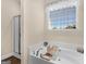 Relaxing bathroom featuring a large soaking tub and a separate shower at 3226 Puritan Way, Mcdonough, GA 30252