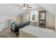 Cozy bedroom with a futon, a display cabinet and a sloped ceiling at 3226 Puritan Way, Mcdonough, GA 30252