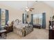 Spacious bedroom with vaulted ceiling, ceiling fan, and large windows with curtains at 3226 Puritan Way, Mcdonough, GA 30252