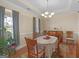 Charming dining room features natural light, traditional furniture, and a warm ambiance for comfortable dining at 3226 Puritan Way, Mcdonough, GA 30252