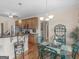 Bright kitchen and breakfast nook combo with granite counters and stainless appliances, seamlessly blending style and functionality at 3226 Puritan Way, Mcdonough, GA 30252