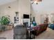 Relaxing living space featuring a fireplace, built-in shelving, and ample seating with plenty of natural light at 3226 Puritan Way, Mcdonough, GA 30252