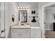 Well-lit bathroom with a granite countertop and neutral wall color at 412 Guildhouse Dr # 38, Mcdonough, GA 30252