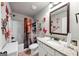 Bright bathroom with granite vanity, shower and tub, and decorated walls at 412 Guildhouse Dr # 38, Mcdonough, GA 30252