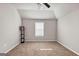Bedroom featuring a ceiling fan, natural lighting and neutral colored carpet at 412 Guildhouse Dr # 38, Mcdonough, GA 30252