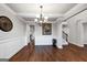 Elegant foyer with hardwood floors, high ceilings, stairway, and access to multiple living areas at 412 Guildhouse Dr # 38, Mcdonough, GA 30252